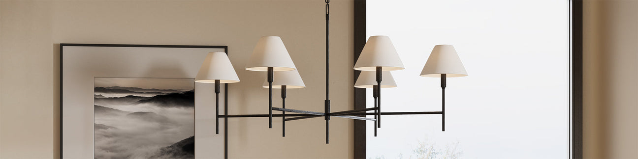 Chandelier Lighting - Bryson 6 Light Chandelier in aged iron finish hung in a modern home.