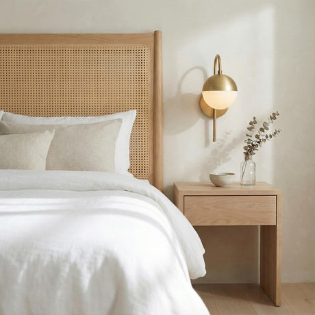 Powell Wall Sconce with Hooded White Globe, Aged Brass