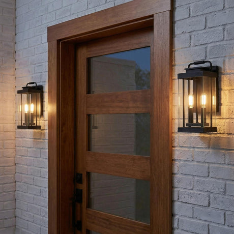 Parker Outdoor Wall Light, Medium Matte Black geometric Outdoor Wall in a Modern Outdoor with white brick and a wood door.