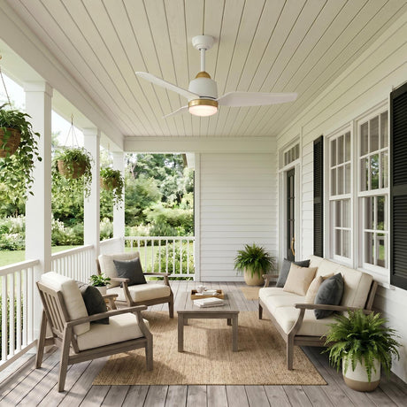 A modern farmhouse porch with white siding and black shutters features the Kent LED Outdoor Ceiling Fan with Light 42", Brushed Brass and White on the shiplap ceiling.