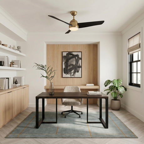 A contemporary office with the Lorain LED Ceiling Fan 54" in brushed brass and matte black mounted over a dark wood desk and light wood built-ins.