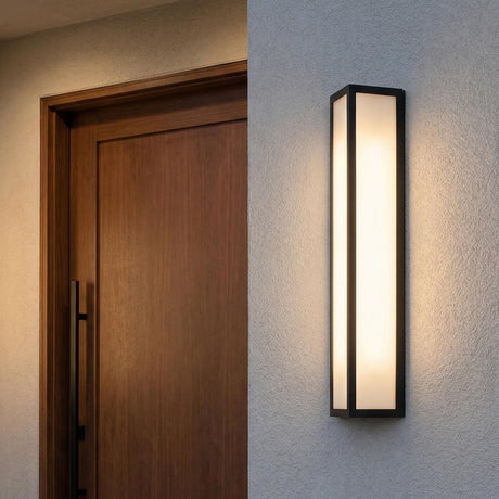 Ellis LED Outdoor Wall Light, Large 29" Black geometric Outdoor Wall in a Modern Outdoor entryway with a dark wood front door.