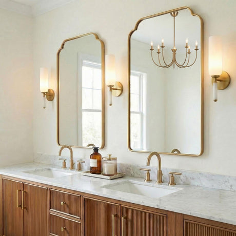 Riona Wall Sconce 15", Antique Brass and Opal Glass linear wall sconce in a Transitional Bathroom with a white marble double vanity.