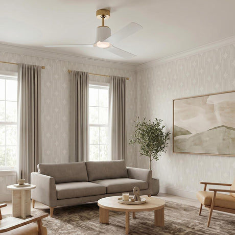 A contemporary living room with the Condor LED Ceiling Fan 52 in Matte White with Modern Brass along the ceiling center over a grey sofa.