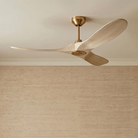 A modern living room with a three-blade Egret Ceiling Fan 52", Whitewash Oak and Modern Brass, along the ceiling above light tan wood-textured wall panels.
