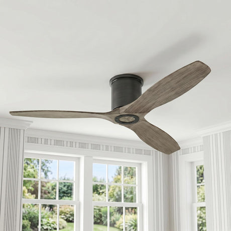 A transitional living room with a Harrier Smart Ceiling Fan 52", Gray Wash Oak and Aged Pewter mounted to the ceiling center near striped wallpapered walls.