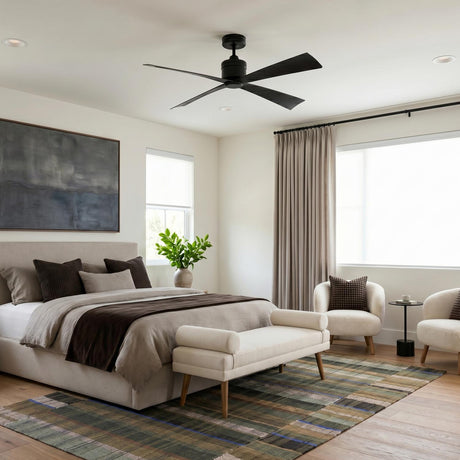 A modern bedroom featuring the Sora Ceiling Fan 44" in matte black installed on the ceiling center above a neutral upholstered bed and plaid area rug.