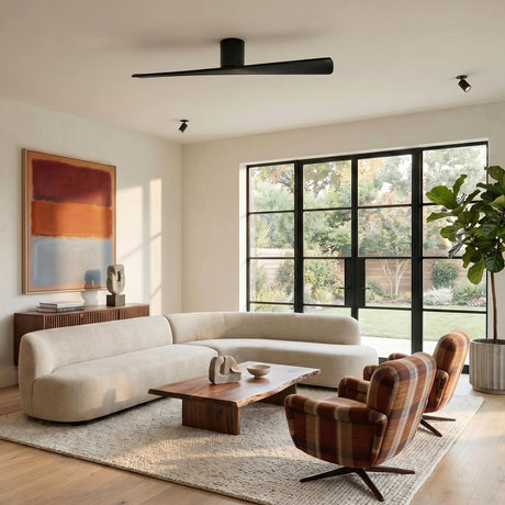 A modern living room with the Finch Smart Ceiling Fan 52", Matte Black Oak centered above a cream curved sofa and a live-edge wood coffee table.